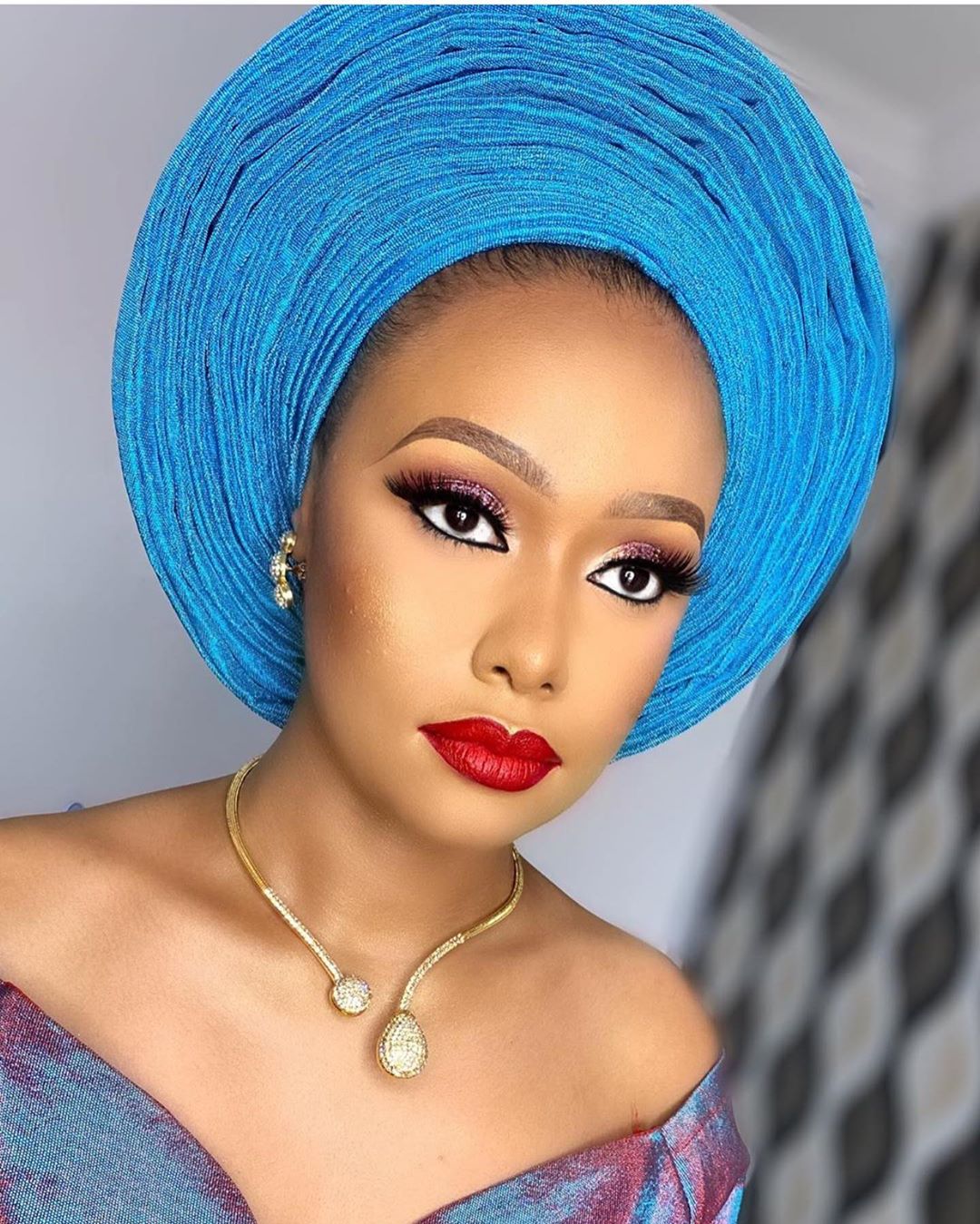 Nigerian Aso Ebi fashionista in traditional wear - Reny styles